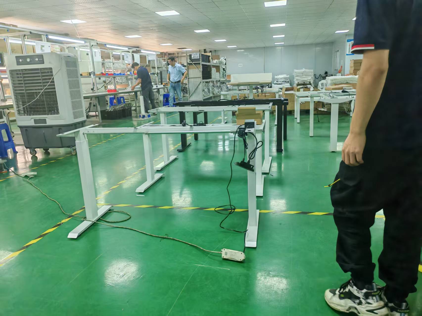 Precyzja w ruchu: dlaczego elektryczne ramy do biurek Huagang zapewniają stabilność